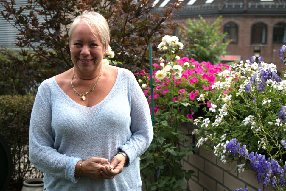 POSITIV NABO: Lena, ektemannen og naboen på Høytorvet terrasse flyttet for å oppsøke livet i byen.