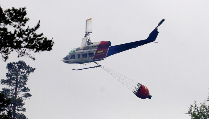 Skogbrann i Øvre Eiker - helikopter bistår